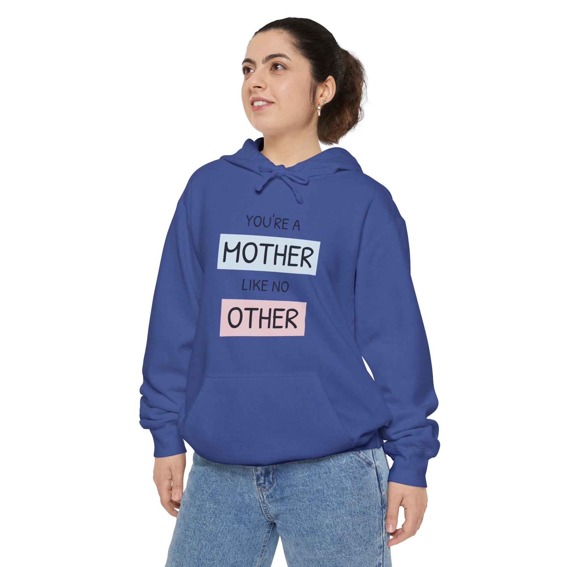 Person wearing a blue hoodie with text on a white background